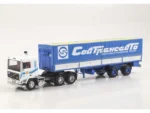 Седельный тягач Volvo F12 с полуприцепом Fruehauf Savoyarde (Совтрансавто) белый/синий