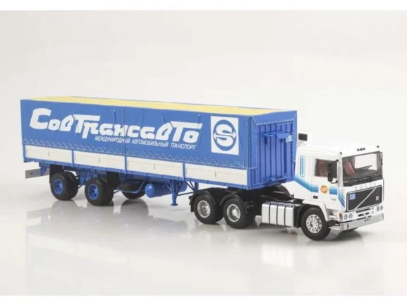 Седельный тягач Volvo F12 с полуприцепом Fruehauf Savoyarde (Совтрансавто) белый/синий — изображение 3